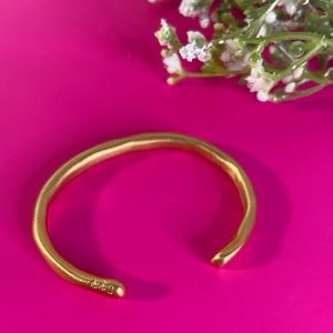 Gold color open bracelet